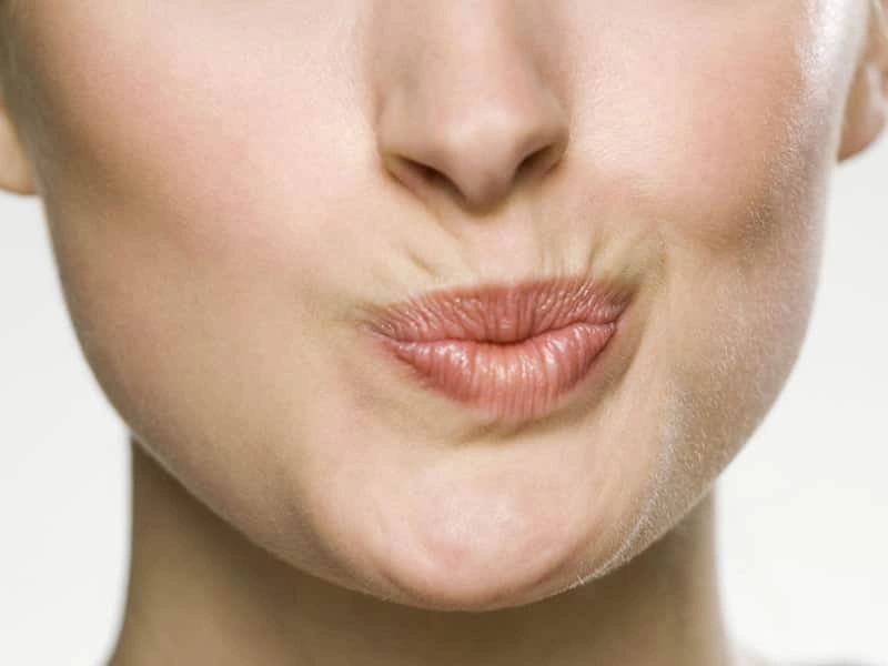 Коррекция кисетных морщин вокруг рта